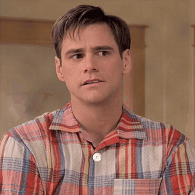 Man In Plaid Shirt With Button Saying II GIF