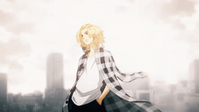 Man In Plaid Shirt With Cityscape GIF