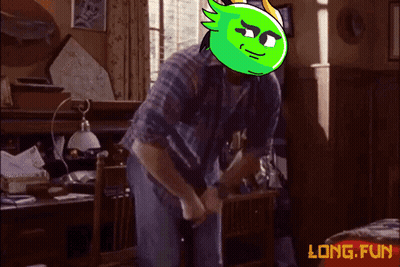 Man In Plaid Shirt With Green Cartoon On Head Saying Long Fun GIF