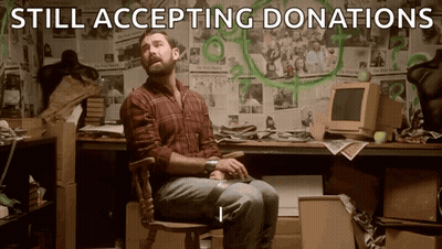 Man In Plaid Shirt With Newspapers Still Accepting Donations GIF
