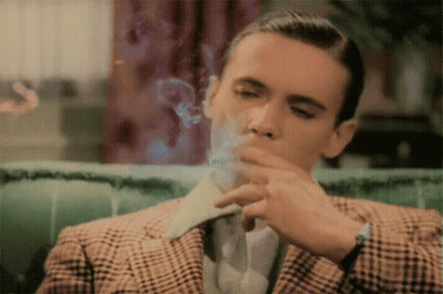 Man In Plaid Suit Smoking Cigarette GIF