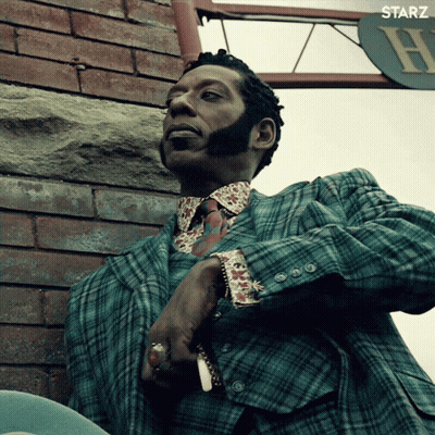 Man In Plaid Suit Smoking Cigarette GIF