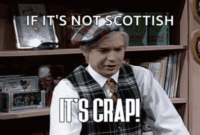 Man In Plaid Vest And Tie Saying If It's Not Scottish It's Crap GIF