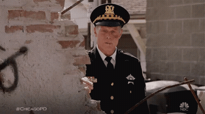 Man In Police Uniform At Brick Wall #Chicagopd GIF