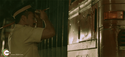 Man In Police Uniform By Vehicle With Www.Zees.Com GIF
