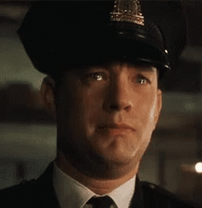 Man In Police Uniform Making Funny Face GIF