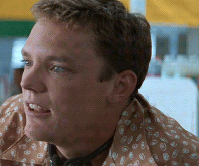 Man In Polka Dot Shirt And Headphones GIF