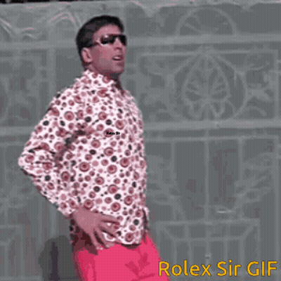 Man In Polka Dot Shirt And Pink Pants With Hands On Hips Rolex Sir GIF