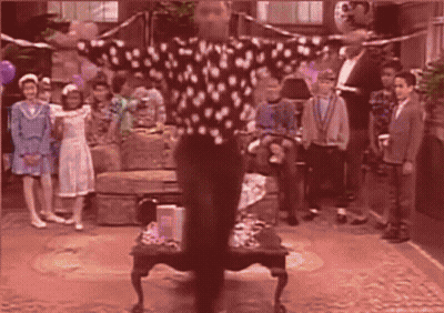 Man In Polka Dot Shirt Dancing Before Crowd GIF