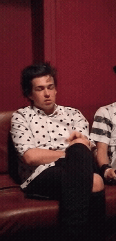 Man In Polka Dot Shirt Eyes Closed GIF