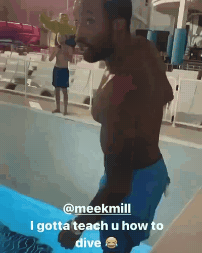 Man In Pool Teaching Dive GIF