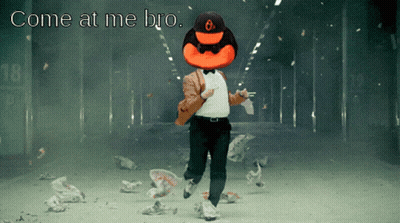 Man In Powell 26 Jersey Next To Mascot GIF
