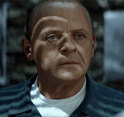 Man In Prison Uniform Close Up GIF