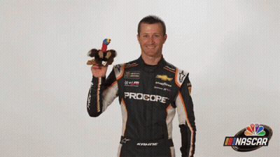 Man In Procore Shirt Holding Stuffed Turkey GIF