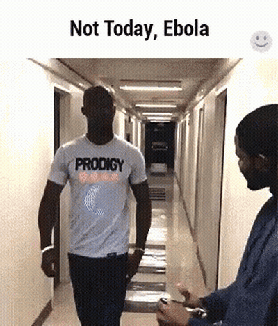 Man In Prodigy Shirt Walking With Another Man GIF