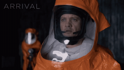 Man In Protective Suit Saying Arrival GIF