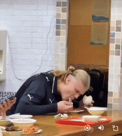 Man In Puma Jacket Eating Noodles With Chopsticks GIF