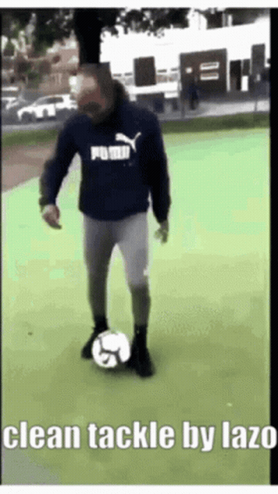 Man In Puma Sweatshirt Kicking Soccer Ball GIF