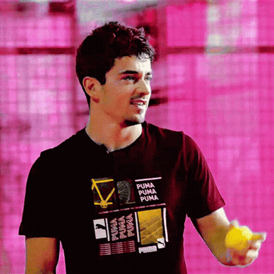 Man In Puma T-Shirt Holding Yellow Ball GIF