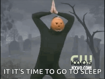 Man In Pumpkin Mask Dancing At Cemetery Saying It's Time To Go To Sleep GIF