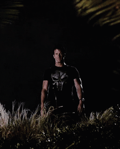 Man In Punisher T-Shirt In Darkness GIF