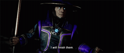 Man In Purple And Gold Outfit Holding Cane Saying I Will Finish Them GIF