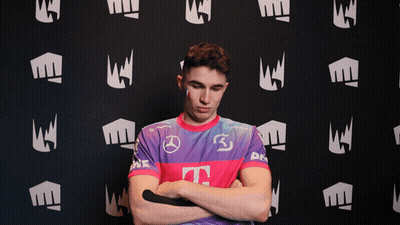 Man In Purple And Pink Shirt With Letter T GIF