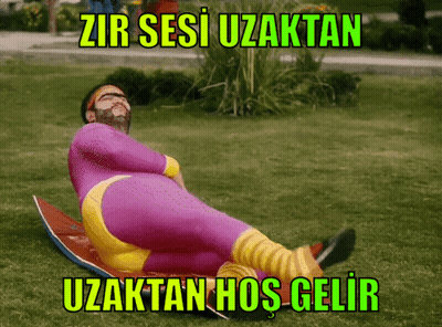 Man In Purple And Yellow Suit On Surfboard Zir Sesi Uzaktan Uzaktan Hos Gelir GIF