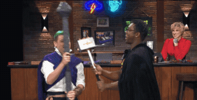 Man In Purple Cape Holding Sword GIF