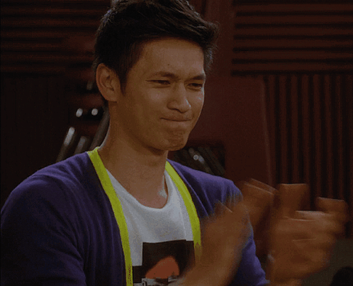 Man In Purple Cardigan Smiling GIF