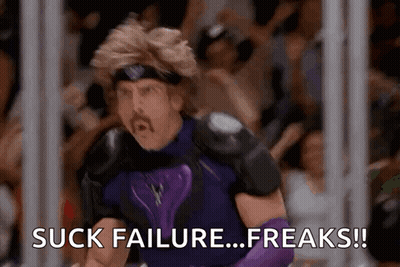 Man In Purple Costume Saying Suck Failure Freaks GIF