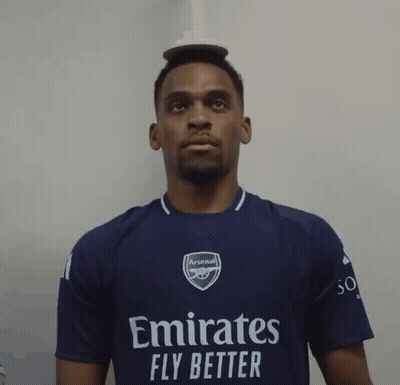 Man In Purple Emirates Fly Better Shirt GIF