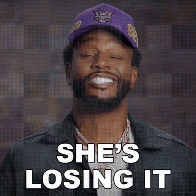 Man In Purple Hat Saying She's Losing It GIF