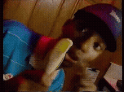 Man In Purple Hat With Eamf Eating Banana GIF