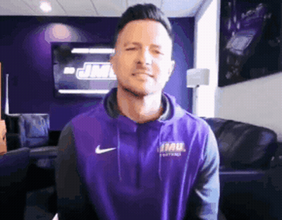 Man in Purple Hoodie With JMU