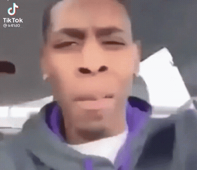 Man in Purple Jacket Funny Face in Car