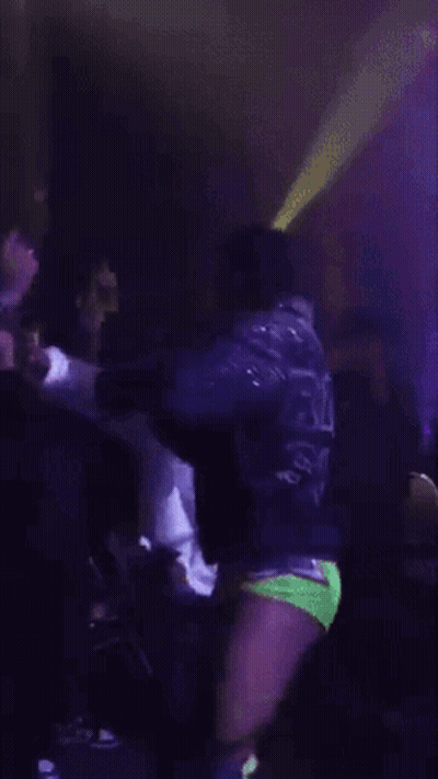 Man In Purple Jacket With Word Ricky GIF