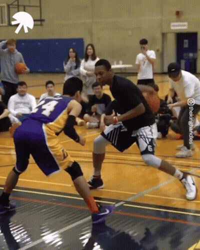 Man In Purple Jersey Dribbling Basketball GIF