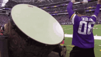 Man In Purple Jersey Number 08 On Football Field GIF
