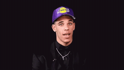 Man In Purple Lakers Hat Winking GIF