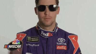 Man In Purple Race Suit And Sunglasses With NASCAR Logo GIF