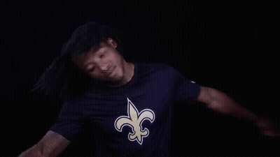 Man In Purple Saints T-Shirt Dancing GIF