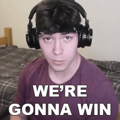 Man In Purple Shirt And Headphones On Bed GIF