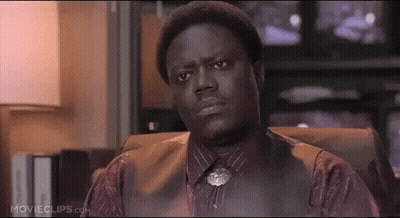 Man In Purple Shirt And Vest Sitting In Chair Movieclips.com GIF