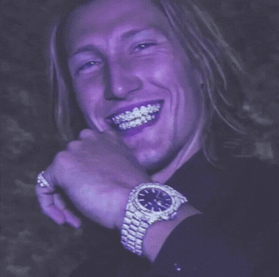 Man In Purple Shirt And White Watch Smiling GIF