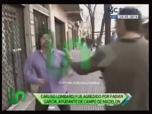 Man in Purple Shirt Being Attacked