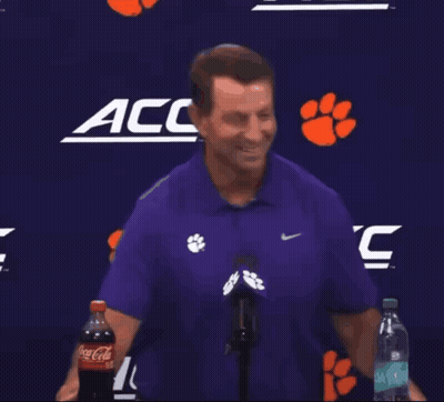 Man In Purple Shirt Holding Coca-Cola GIF