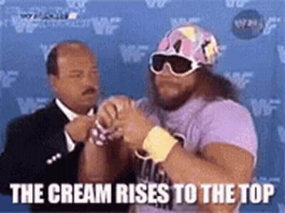 Man In Purple Shirt Next To Man In Suit GIF