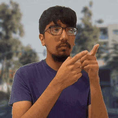 Man In Purple Shirt Pointing GIF