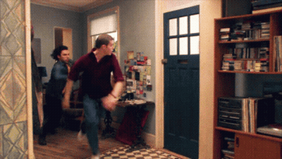 Man In Purple Shirt Running GIF